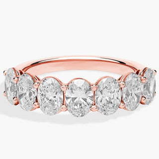 14k rose gold oval diamond ring with seven stones (3 carat total weight)