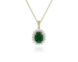 Oval Pendant with Sunburst Halo of Diamonds and Emeralds in 14k Yellow Gold (9x7mm)