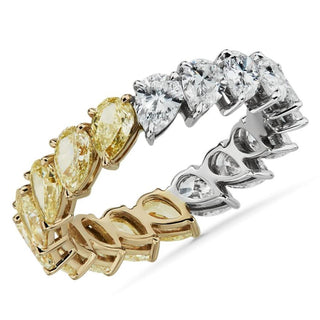 An 18k yellow and white gold pear-cut half-and-half yellow diamond eternity ring (3 5/8 CTw)