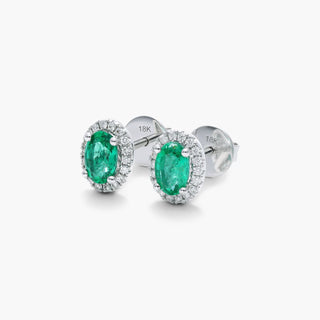 18K White Gold Oval Halo Emerald And Diamond Earrings (6.0x4.0mm)