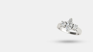 Three-stone ring with custom diamond setting