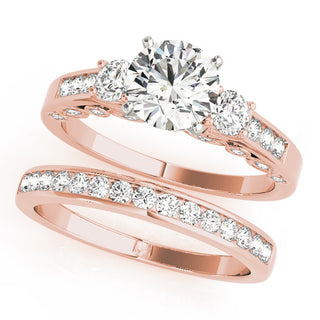 ENGAGEMENT RINGS 3 STONE ROUND