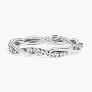 A little 14k white gold diamond eternity ring with a twist (1/5 carat total weight).