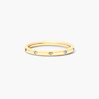 14K yellow gold diamond ring with a 2 mm bezel set.