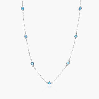 Blue topaz station necklace, 14K white gold