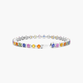 Tennis bracelet in 14K white gold, oval shape, multi-colored sapphire and diamond.