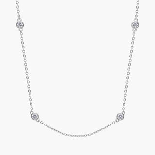 14k white gold diamond station and heart necklace (1/2 carat total weight)