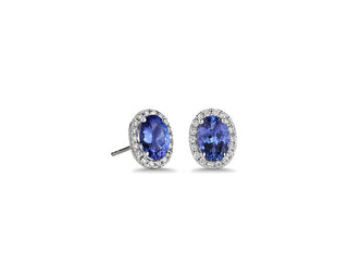 Oval Tanzanite And Diamond Halo Stud Earrings In 14k White Gold (5x7mm)