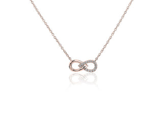 A little 14k rose gold infinity necklace with split diamonds.