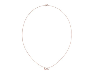 A little 14k rose gold infinity necklace with split diamonds.