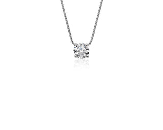 Platinum Floating Diamond Solitaire Pendant by  (.60 carat total weight)