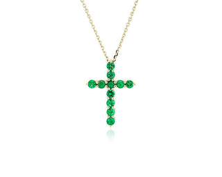 14k yellow gold pendant with an emerald cross