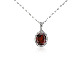 Pendant Set of Garnet and Diamonds in 14k White Gold (10x8mm)