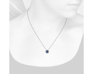 14k White Gold Pendant with Tanzanite and Diamond Halo (7mm)