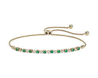 Small 14k yellow gold bolo bracelet with emerald and diamonds (2.2 mm)