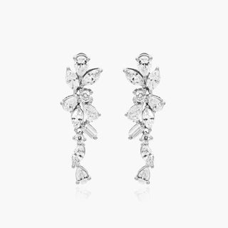 Diamond dangle earrings crafted in West Palm Beach