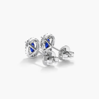 18K White Gold Oval Halo Sapphire And Diamond Earrings (6.0x4.0mm)