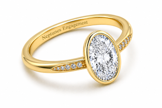 Tapered Pavé Band Bezel Setting on an Oval Cut Engagement Ring